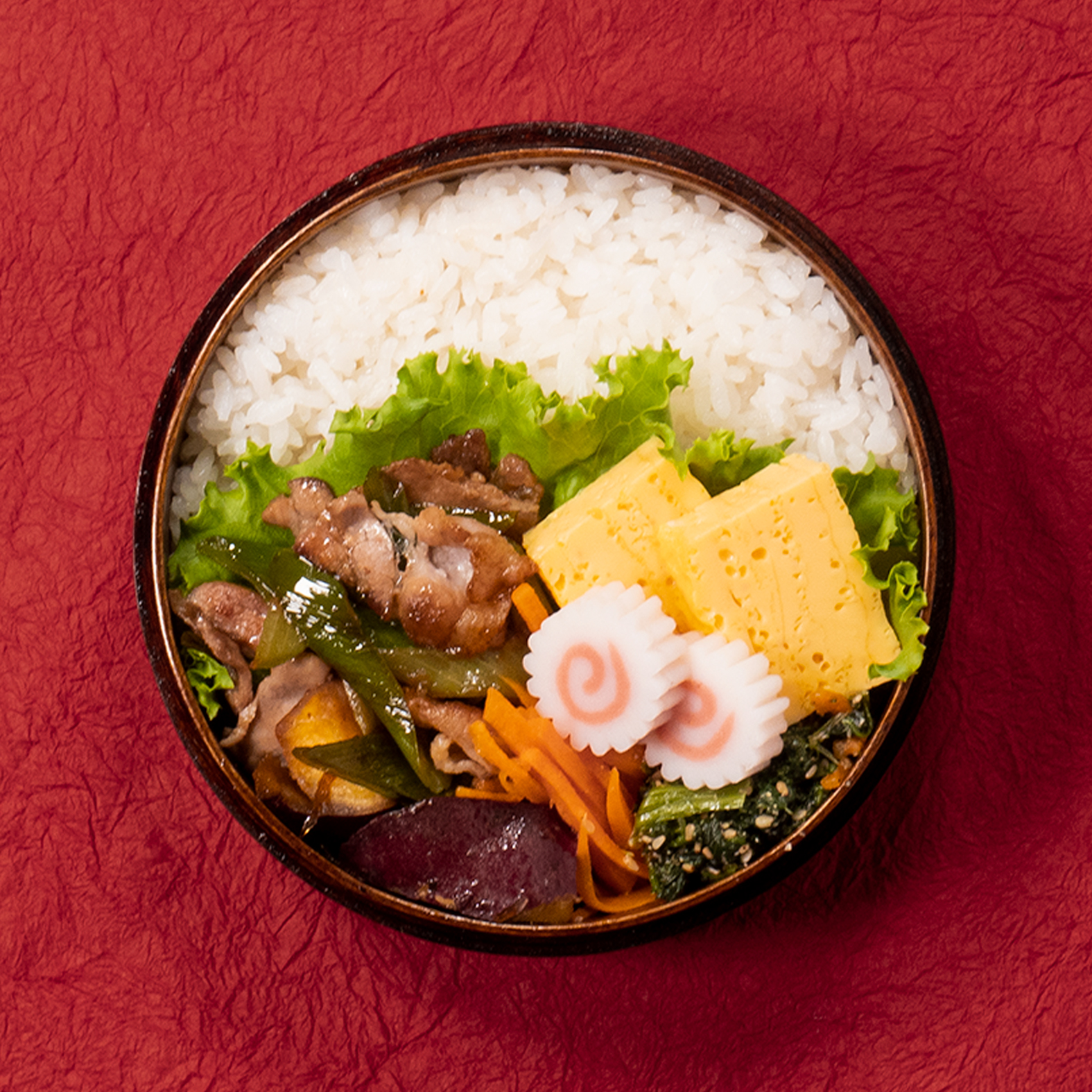 Simmered sweet potato and pork plate Bento